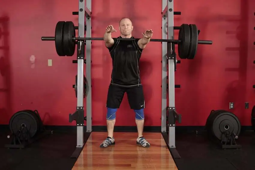 The Zombie-Rack Squat: Arms Out, Throat Touching
